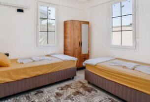 como organizar quarto de solteiro pequeno